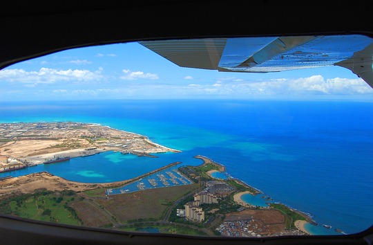 Plane landing in Hawaii from mainland USA.
