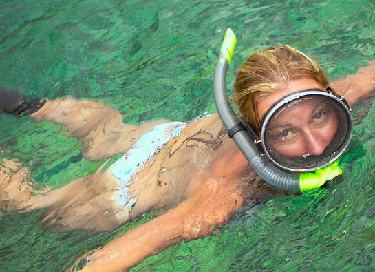 Girl snorkeling in Pacific Ocean, Maui, Hawaii