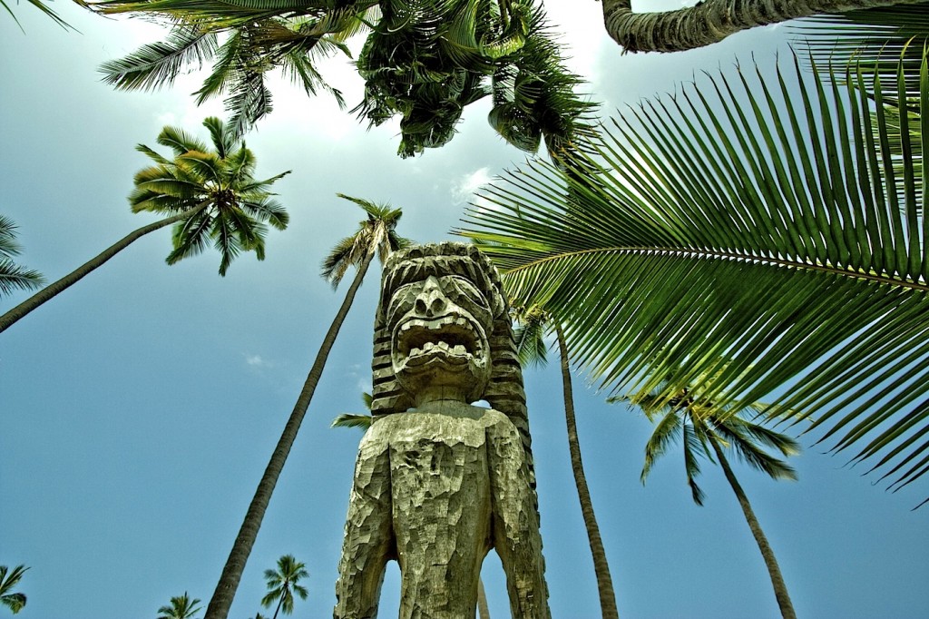 Ancient Hawaiian carved wood statue in Pu'honua o Hanaunau National Historical Park in Big Island, Hawaii