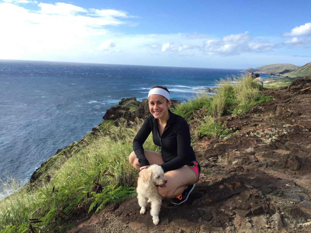 Girl with dog on hike