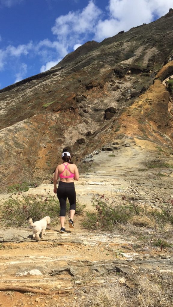 girl and dog hiking