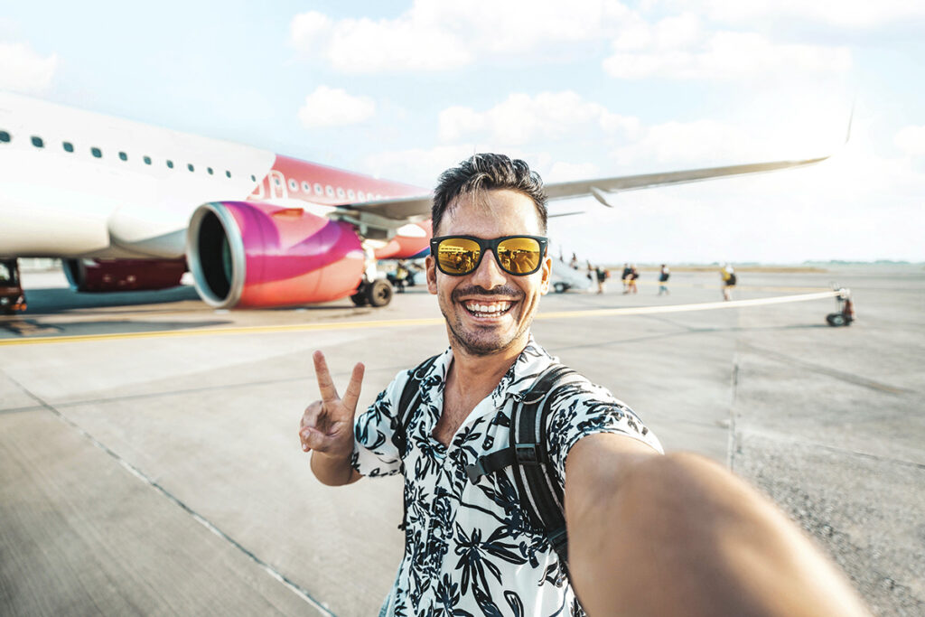 Young Man Boarding a Plane