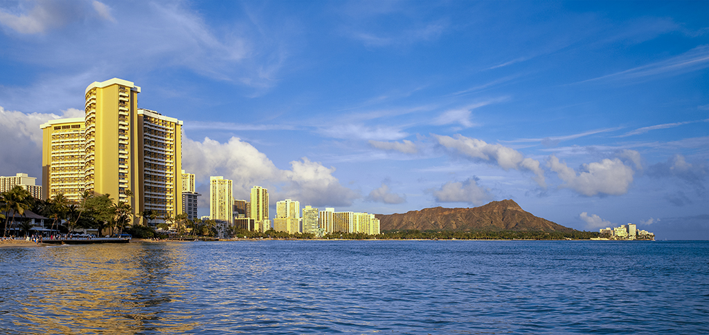 Late afternoon sunlight on Diamond Head and Waikiki Beach, Honalulu on the island of Oahu, Hawaii, USA.