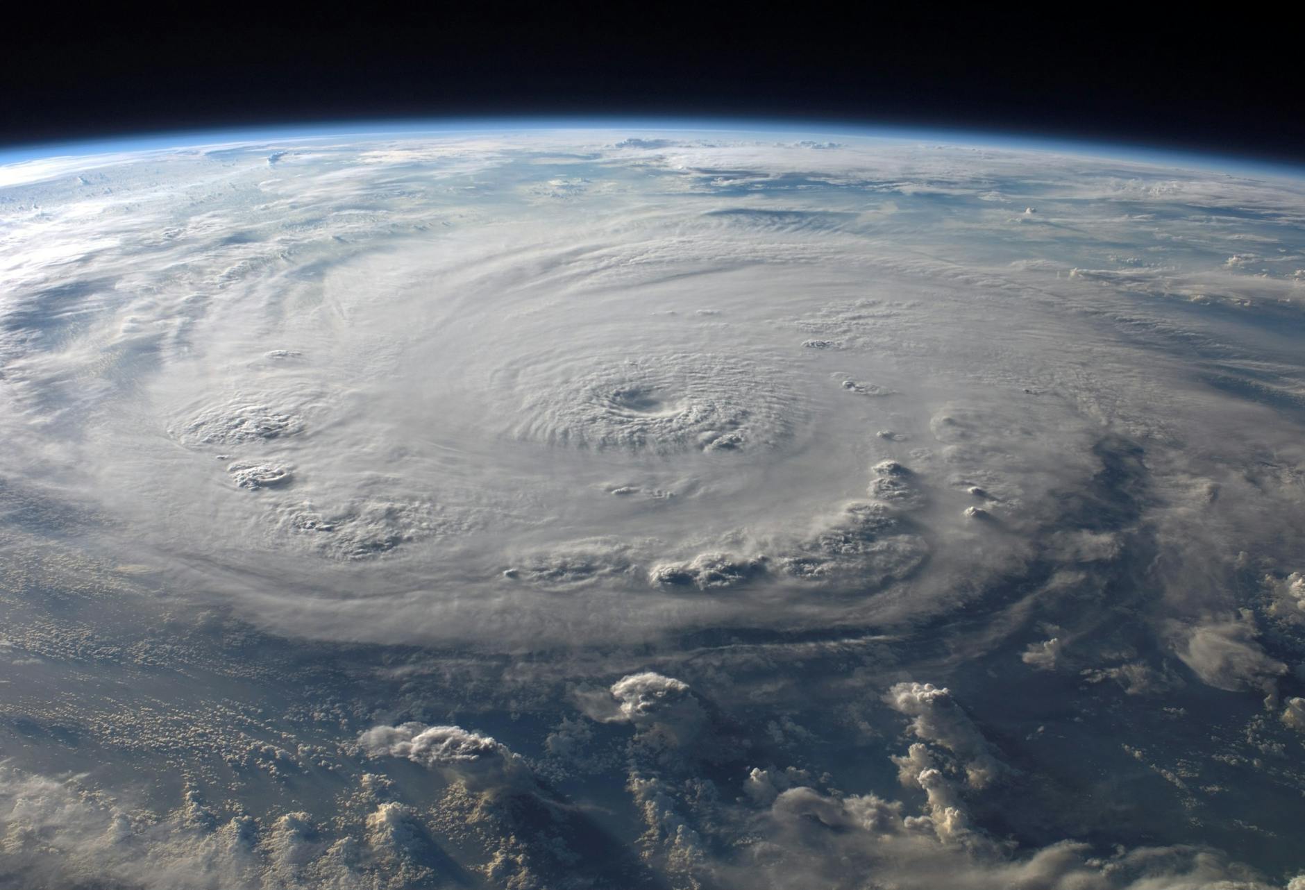 A stunning aerial view of Earth with a massive swirling hurricane, highlighting meteorological beauty. (Photo by Pixabay via Pexels)
